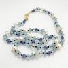 Tanzanite, Aquamarine, Blue Topaz and Rock Crystal Necklace